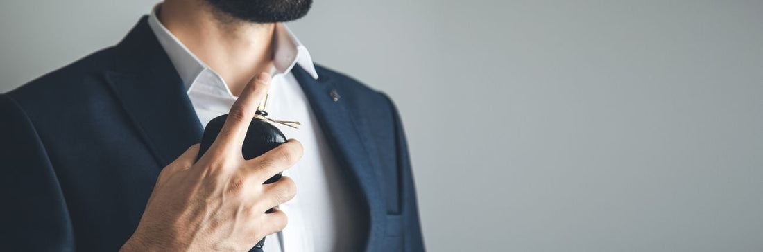 Man Applying Luxury Niche Perfume