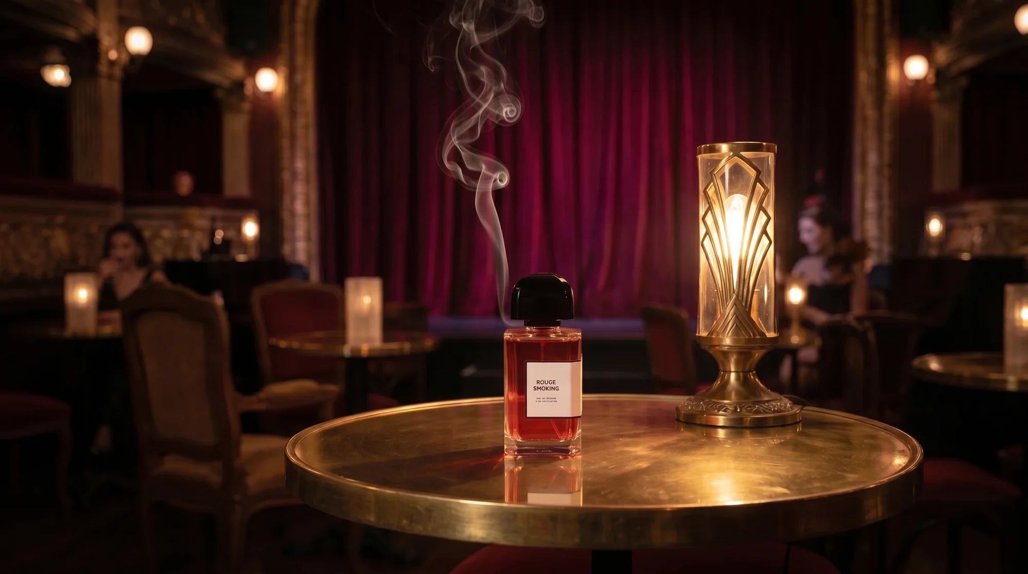 BDK Parfums Rouge Smoking bottle on a brass table in a Parisian cabaret at night